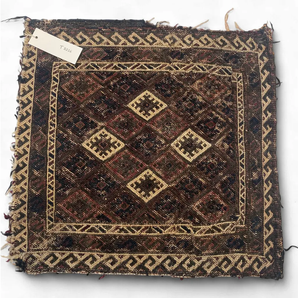 Bag face – wool, - pile - hooked lozenge lattice in central field - cell border - woven tassels. 55 x 52cm Image 1++